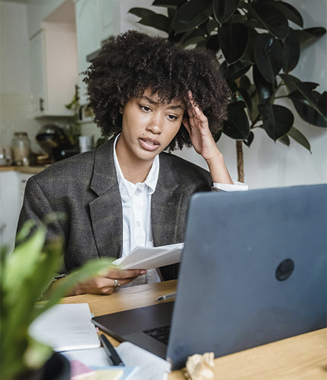 Busy women working and looking overburden, represents how individual counseling in Orange County can help you feel confidence and relief.