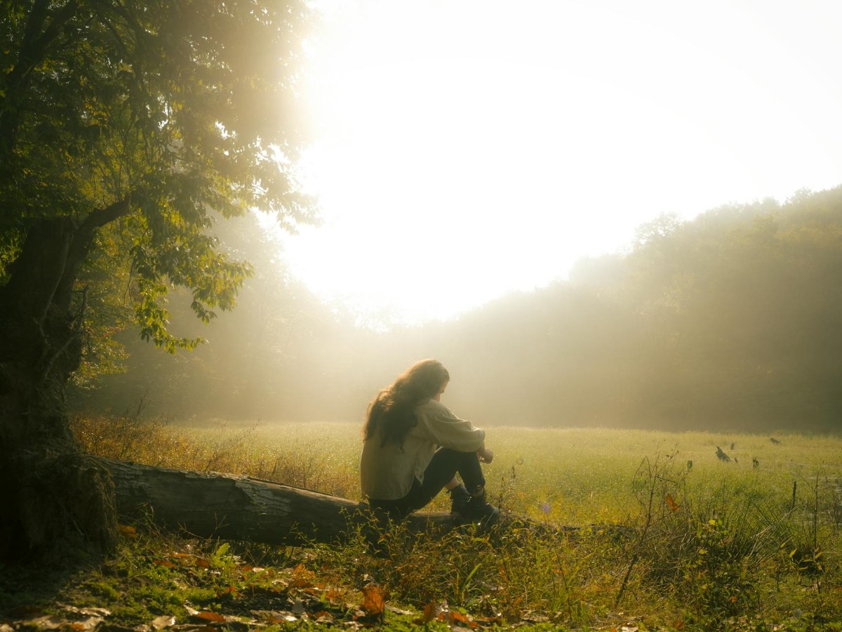 Physical symptoms of anxiety that feel scary but aren’t dangerous illustrated by calm person looking down