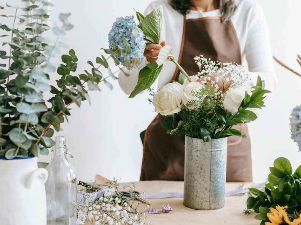 Person arranging flowers wondering why do I overthink everything?