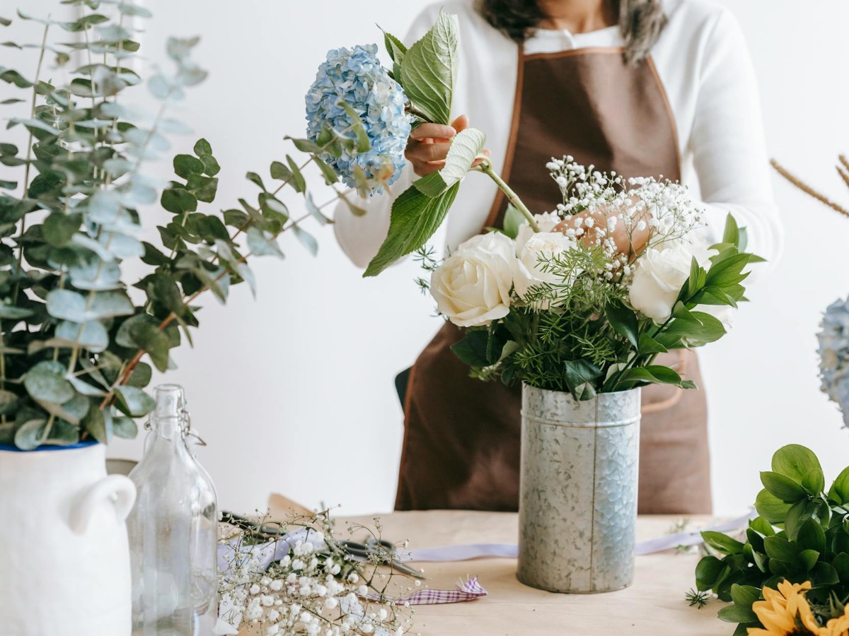 Person arranging flowers wondering why do I overthink everything?